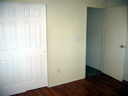 Front bedroom - door leads to hallway.